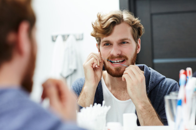 man-flossing